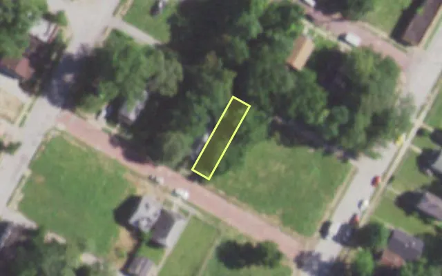 Aerial view of 5561 POWERS AV — vacant lot, St. Louis with approximate parcel outline