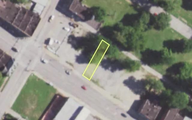 Aerial view of 5751 DR MARTIN LUTHER KING DR — vacant lot, St. Louis with approximate parcel outline