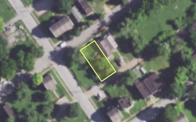 Aerial view of 1444 JOHN AV — vacant lot, St. Louis with approximate parcel outline