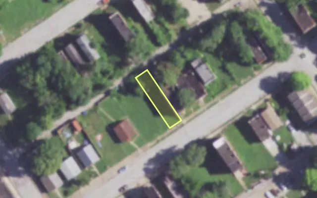 Aerial view of 2025 JOHN AV — vacant lot, St. Louis with approximate parcel outline