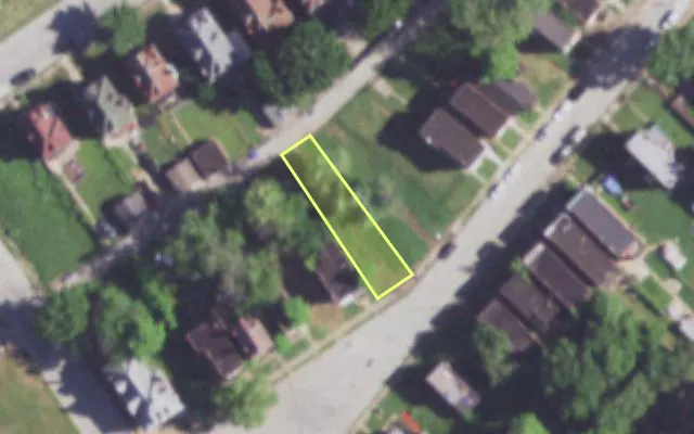 Aerial view of 1945 ALICE AV — vacant lot, St. Louis with approximate parcel outline