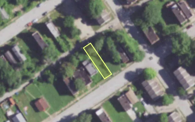 Aerial view of 2011 JOHN AV — vacant lot, St. Louis with approximate parcel outline