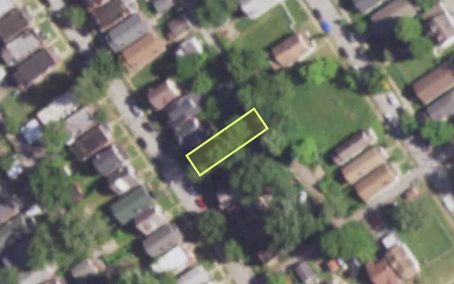 Aerial view of 4931 THEKLA AV — vacant lot, St. Louis with approximate parcel outline