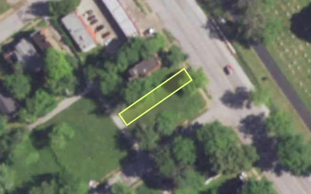 Aerial view of 5706 W FLORISSANT AV — vacant lot, St. Louis with approximate parcel outline