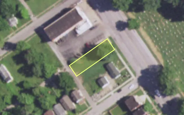 Aerial view of 5574 W FLORISSANT AV — vacant lot, St. Louis with approximate parcel outline