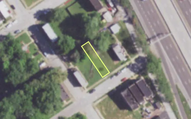 Aerial view of 1119 JOHN AV — vacant lot, St. Louis with approximate parcel outline