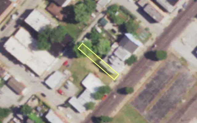 Aerial view of 7017 S BROADWAY — vacant lot, St. Louis with approximate parcel outline