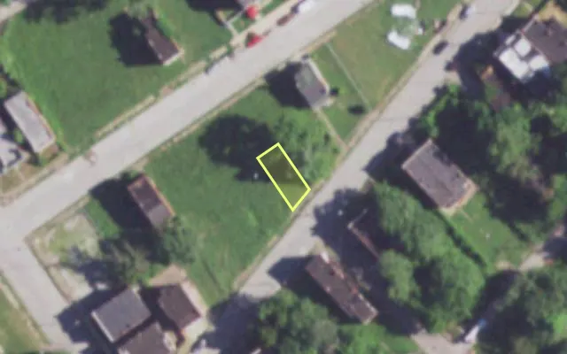 Aerial view of 2027 E WARNE AV — vacant lot, St. Louis with approximate parcel outline