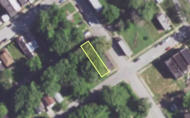Aerial view of 1403 JOHN AV — vacant lot, St. Louis with approximate parcel outline