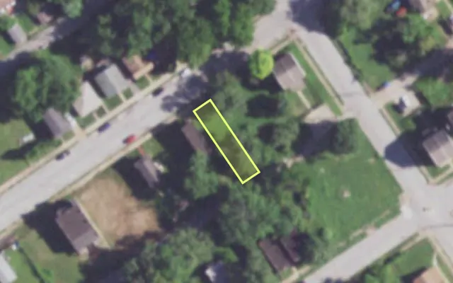 Aerial view of 1514 JOHN AV — vacant lot, St. Louis with approximate parcel outline