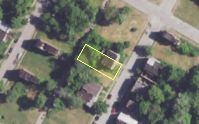 Aerial view of 1909 COLEMAN ST — vacant lot, St. Louis with approximate parcel outline