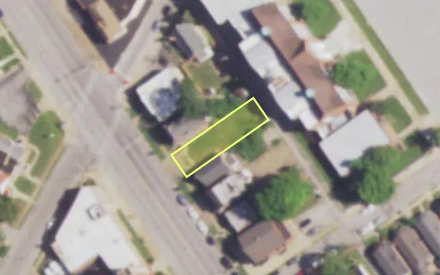 Aerial view of 6079 W FLORISSANT AV — vacant lot, St. Louis with approximate parcel outline