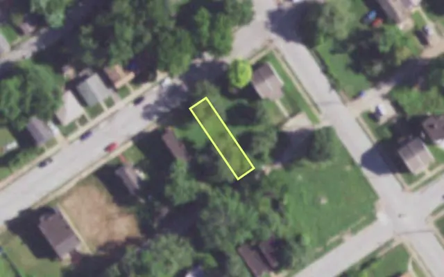 Aerial view of 1510 JOHN AV — vacant lot, St. Louis with approximate parcel outline