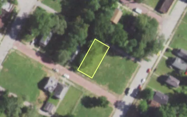Aerial view of 5559 POWERS AV — vacant lot, St. Louis with approximate parcel outline