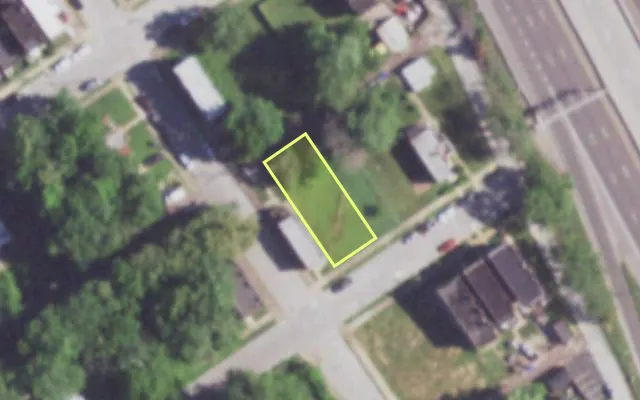 Aerial view of 1125 JOHN AV — vacant lot, St. Louis with approximate parcel outline
