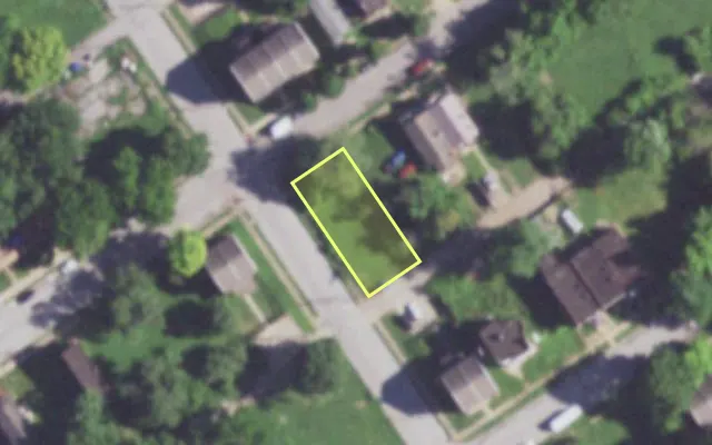 Aerial view of 1446 JOHN AV — vacant lot, St. Louis with approximate parcel outline