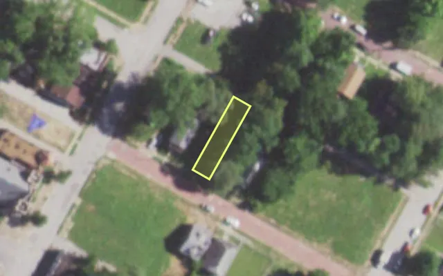 Aerial view of 5571 POWERS AV — vacant lot, St. Louis with approximate parcel outline