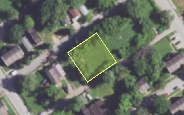 Aerial view of 1420 JOHN AV — vacant lot, St. Louis with approximate parcel outline