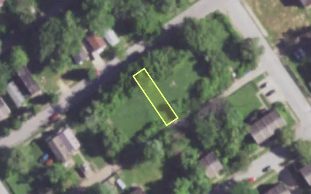 Aerial view of 1418 JOHN AV — vacant lot, St. Louis with approximate parcel outline